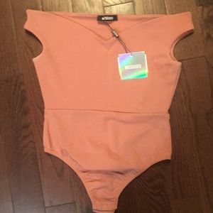 Missguided pink bodysuit size (M)